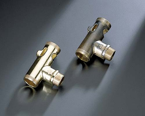 Threaded brass flush valve bodies before and after surface finishing